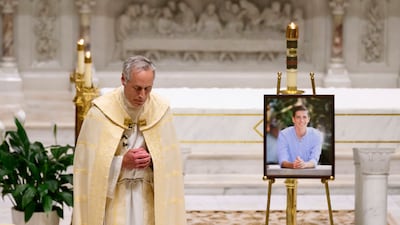 Pastor Jim Bilot during a memorial service for Brian Fraser, one of the victims, in Grosse Pointe Farms, Michigan. AP