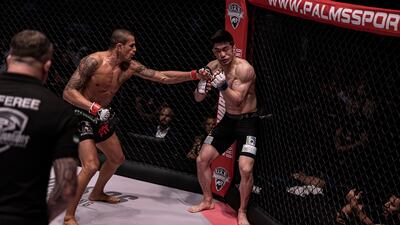 Bruno Machado throws a left against Yun Jae Jung in their UAE Warriors title match.