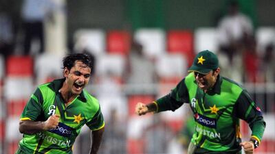 Pakistani spinner Mohammad Hafeez, left, has not been doing much celebrating of late with captain Misbah ul-Haq or any of his other teammates for that matter. Aamir Oureshi / AFP