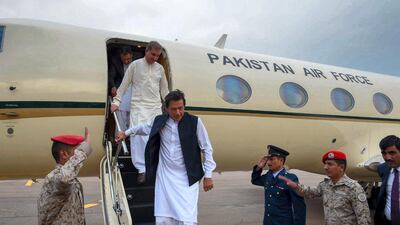 Pakistani Prime Minister Imran Khan steps off the plane in Jeddah. Saudi Press Agency