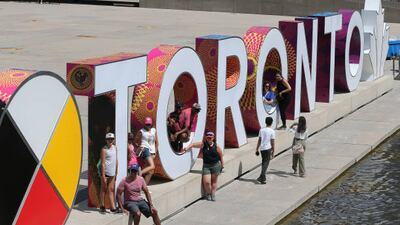 People gather at Nathan Phillips Square in Toronto. Ontario remains in stage three of its reopening as Covid-19 cases rise. Toronto Star via Getty Images