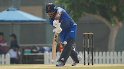 UAE's Rahul Chopra batted on after receiving medical assistance during the Cricket World Cup League Two match against the Netherlands in Dubai. Photo: ECB / ICC