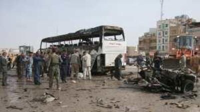 The scene of a car bombing that killed four people yesterday in the holy city of Najaf, an area that was previously believed to be safe.