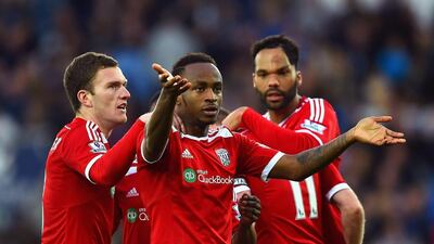 Saido Berahino celebrates a goal with West Brom teammates in a Premier League match against Leicester City last season. Laurence Griffiths / Getty Images / November 1, 2014
