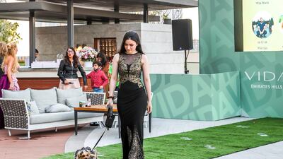 Rachel Cruickshank and Cookie walk the runway. Courtesy Boujie Paws Co