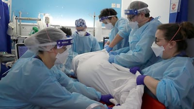 Critical Care staff prone a Covid-19 patient on the Christine Brown ward at King's College Hospital in London in January 2021. AP Photo