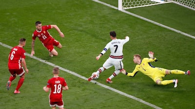Cristiano Ronaldo rounds Hungary goalkeeper Peter Gulacsi before making it 3-0. Reuters