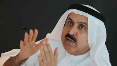 Minister of Labour Saqr Ghobash gives journalists an overview of labour reforms that aim to tighten oversight of employment agreements for temporary migrant workers. Kamran Jebreili / AP Photo