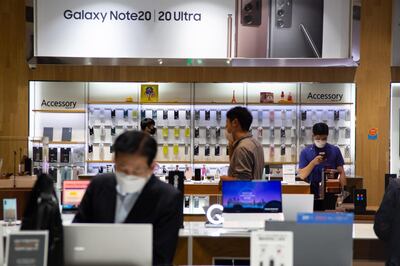 Customers visiting the Samsung Electronics gallery at the company's headquarters in Seoul. EPA