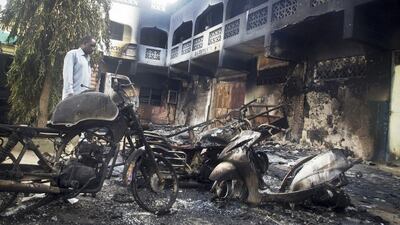 Dozens of suspected Somali extremists wielding automatic weapons attacked the small Kenyan coastal town of Mpeketoni on June 16, 2014, attacking police stations, setting fire on hotels, and spraying bullets into the street killing at least 49 people. AP Photo