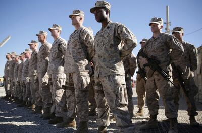 US Marines stand guard during the change of command ceremony at Task Force Southwest military field in Shorab military camp of Helmand province, Afghanistan. AP Photo