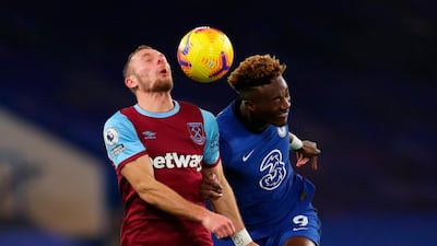 West Ham's Vladimir Coulfal and Chelsea's Tammy Abraham challenge for a header. EPA