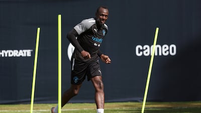 Track legend and World XI's captain Usain Bolt during training for Soccer Aid 2022. Reuters