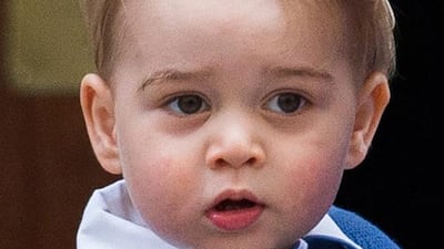 Britain’s Prince George being carried by his father, the Duke of Cambridge, as they arrive at the Lindo Wing to visit his mother and newborn baby sister at St Mary’s Hospital in Paddington, west London, Britain. Andrew Cowie / EPA