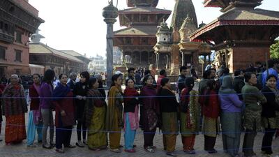 Nepalese voters queue to cast their ballots at a polling station in Patan on the outskirts of Kathmandu, during the second free election in the country’s history in November. AFP / Prakash Mathema