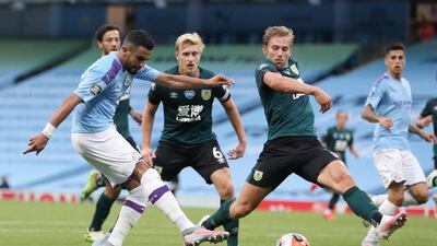 Manchester City's Riyad Mahrez, left, shoots to score his team's second goal. AP Photo