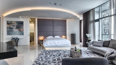 The master bedroom with his and hers dressing rooms. Courtesy LuxuryProperty.com