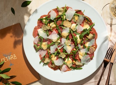 Beef carpaccio with black truffle and mustard is a standout dish at Cetara. Photo: Address Downtown