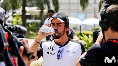 Spanish Formula One driver Fernando Alonso of McLaren walks through the paddock at the Sepang Circuit Medical Centre in Sepang, Malaysia, on March 26, 2015. Srdjan Suki / EPA