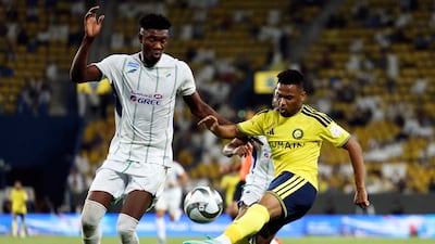 Al Nassr's Ayman Yahya vies for the ball with Al Fateh's Kennedy Boateng. Reuters
