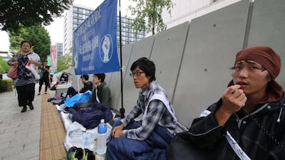 University students are staging a hunger strike in front of the National Diet building in Tokyo to protest against Japanese prime minister Shinzo Abe's controversial security bills. Yoshikazu Tsuno / AFP Photo