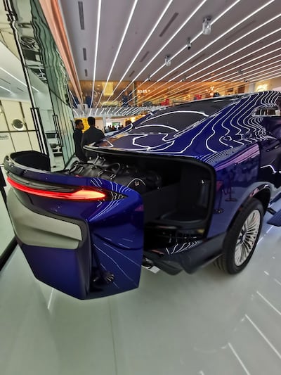 The boot opens like a sliding drawer, making it easier to reach items. Photo: Adamas Motors