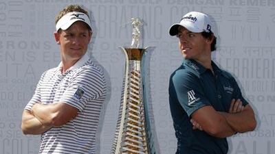 Rory McIlroy, right, does not think he can get past Luke Donald as the European Tour’s top money winner.