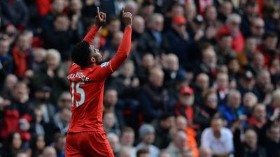 Liverpool’s English striker Daniel Sturridge celebrates scoring his team’s second goal during the Premier League match between Liverpool and Stoke City at Anfield in Liverpool, northwest England on April 10, 2016. AFP / OLI SCARFF