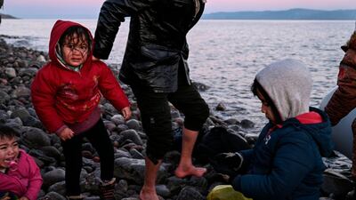 Refugees and migrants land on the Greek island of Lesbos on Monday. AFP