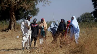 Parents wait for news on their children. AP Photo