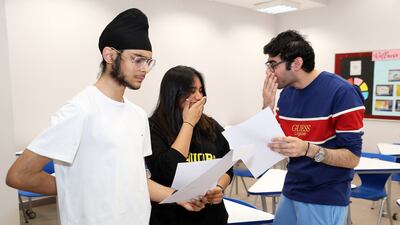 Left to right: Kabir Singh Pujji, Trisha Agarwal and Bhumit Singh are excited after receiving their IB results.