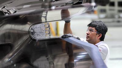 A Worker working on the parts for Airbus and Boeing in the Autoclave section at the Strata Manufacturing facility in Al Ain. Pawan Singh/The National