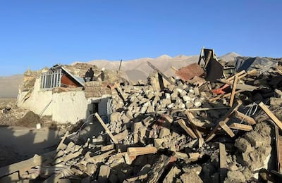 Destroyed homes in Tonglai village in Dinggye county, Tibet, after a 6.8 magnitude earthquake on Tuesday. Xinhua / AP