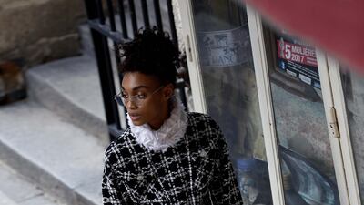 Belted dress in checked tweed with an embroidered mock turtleneck and patch-flap pockets; and rounded spectacles by Chanel Haute Couture