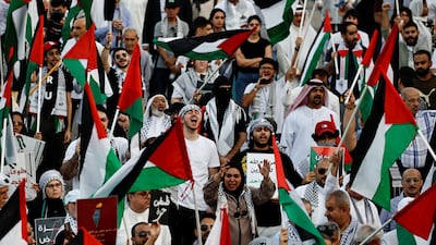 Protesters show support for Palestinians during a sit-in demonstration in Manama. Reuters