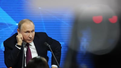 Russian President Vladimir Putin listens to a question from the audience during his annual news conference in Moscow, Russia, on Thursday, Dec. 20, 2018. Bloomberg
