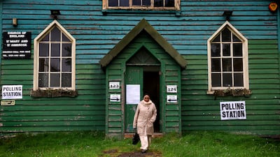 A voter leaves a polling station in Birmingham. Reuters