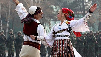 Members of a Kosovar folklore group perform during an official ceremony of the change of command of the Kosovo Security Forces in Pristina, the capital. Valdrin Xhemaj / EPA