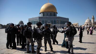 Israeli policemen gather during clashes with Palestinian worshippers at Al Aqsa Mosque compound on the first day of Eid Al-Adha in Jerusalem. EPA