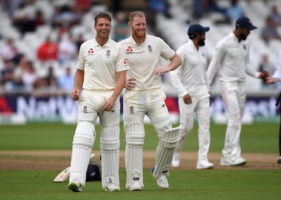 Jos Buttler, left, and Ben Stokes came together when England were tottering at 62-4. Getty Images