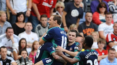David Meyler, Adam Johnson and Stephane Sessegnon celebrate Steven Fletcher's goal for Sunderland at the Liberty Stadium. Tom Dulat/Getty Images