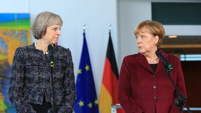 Theresa May and Angela Merkel pause during a news conference at the Chancellery in Berlin, Germany, November 18, 2016. Bloomberg