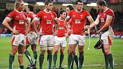 Wales' players look dejected after their 33-12 defeat to Australia in Cardiff.
