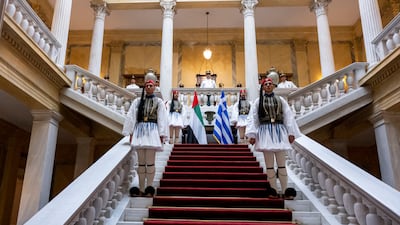 Greek honour guards stand during a reception at the Presidential Mansion in Athens.