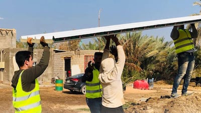 Volunteers from Iraqi Builders rebuild a house. Photo: Iraqi Builders
