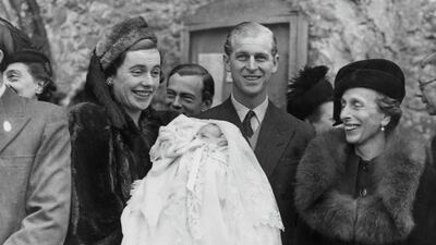 Prince Philip attends a christening in 1947, shortly after his engagement to Princess Elizabeth, before she was crowned Queen, was announced. Douglas Miller/Keystone/Hulton Archive/Getty Images