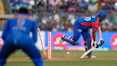 Delhi Capitals' Prithvi Shaw is bowled out by Mumbai Indians' Jasprit Bumrah. AP