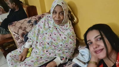 Ms Mustafa with her late mother-in-law back in Sudan right after she learnt she was expecting twins.