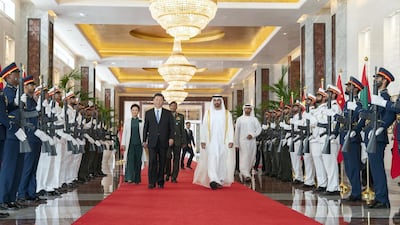 Sheikh Mohammed bin Zayed and Xi Jinping at the Presidential Airport at the end of an historic three-day state visit. Mohamed Al Hammadi/Crown Prince Court - Abu Dhabi