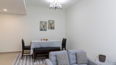 The apartment has three bathrooms and three balconies and there is a lot of natural light